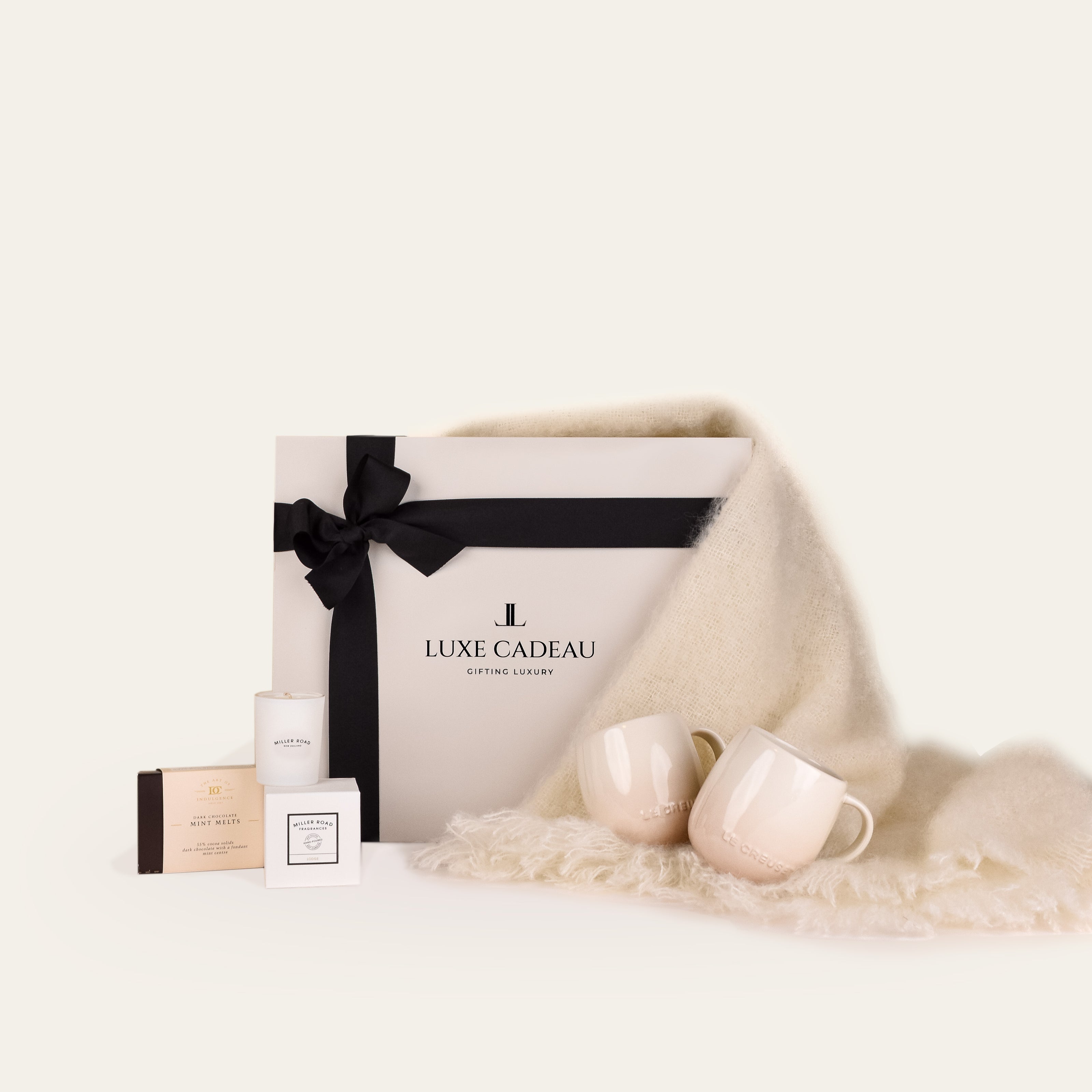 Luxe Cadeau Evening Hour gift box in stone with a dove white mohair throw.