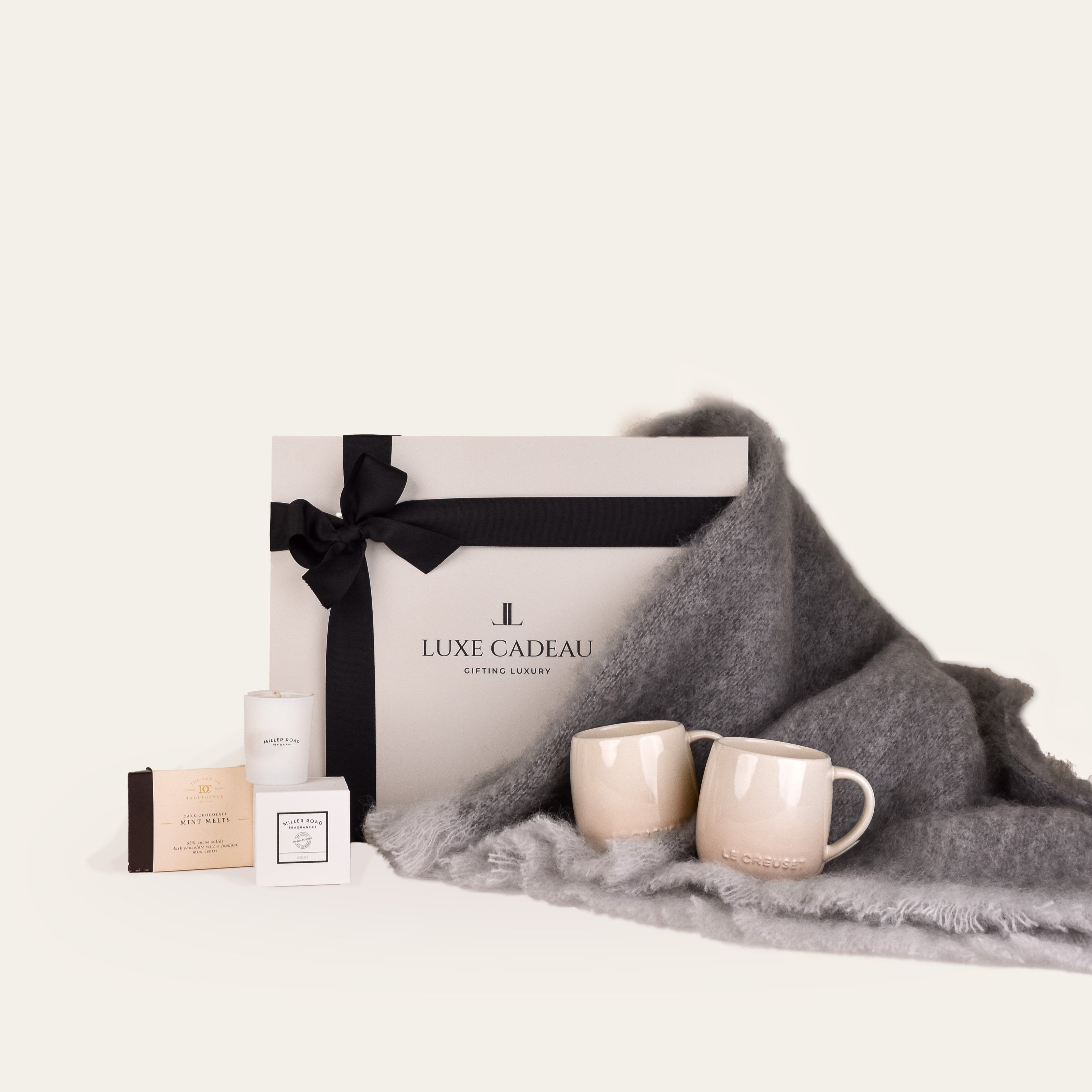Luxe Cadeau Evening Hour gift box in stone with a pewter mohair throw.